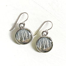 Load image into Gallery viewer, Silver earrings with nature-themed design on a white background