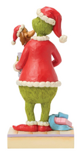 Load image into Gallery viewer, Christmas-themed figurine of a character in a red outfit with a hat, green body, and white beard.
