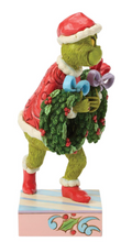 Load image into Gallery viewer, Colorful figurine of a character holding a wreath on a white background