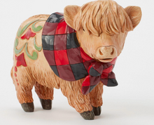 Load image into Gallery viewer, Statue of a Highland cow wearing a red and black checkered blanket on a white background