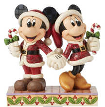 Load image into Gallery viewer, Disney's Mickey and MInnie Mouse figurines holding candy canes on a decorative base. Artist Jim Shore.