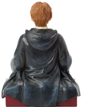 Load image into Gallery viewer, Figurine of a Ron from Harry Potter  in a school uniform holding a Skabbers the rat on a decorative base.