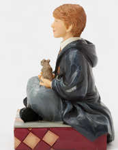 Load image into Gallery viewer, Figurine of a Ron from Harry Potter  in a school uniform holding a Skabbers the rat on a decorative base.