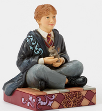 Load image into Gallery viewer, Figurine of a Ron from Harry Potter  in a school uniform holding a Skabbers the rat on a decorative base.