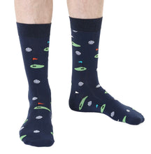 Load image into Gallery viewer, Navy socks with golf course pattern worn by a person on a white background