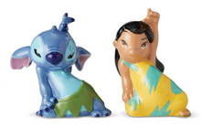 Load image into Gallery viewer, Two ceramic figurines of a blue character and a girl in a yellow dress on a white background