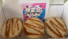 Load image into Gallery viewer, Three bonbons with caramel drizzle in a box with a Valentine's Day card.
