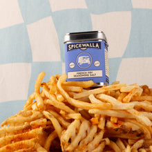 Load image into Gallery viewer, Spicewalla French Fry Seasoning Salt can on a pile of fries with a checkered background