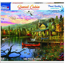 Load image into Gallery viewer, Jigsaw puzzle box featuring a sunset cabin scene with mountains and trees.