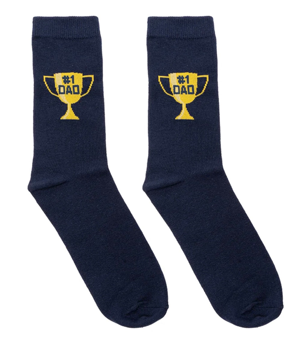 Navy blue socks with gold trophy design labeled '#1 Dad' on a white background
