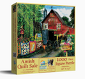 Jigsaw puzzle box featuring a red barn, quilted wagon, and horse with 'Amish Quilt Sale' text.

Details