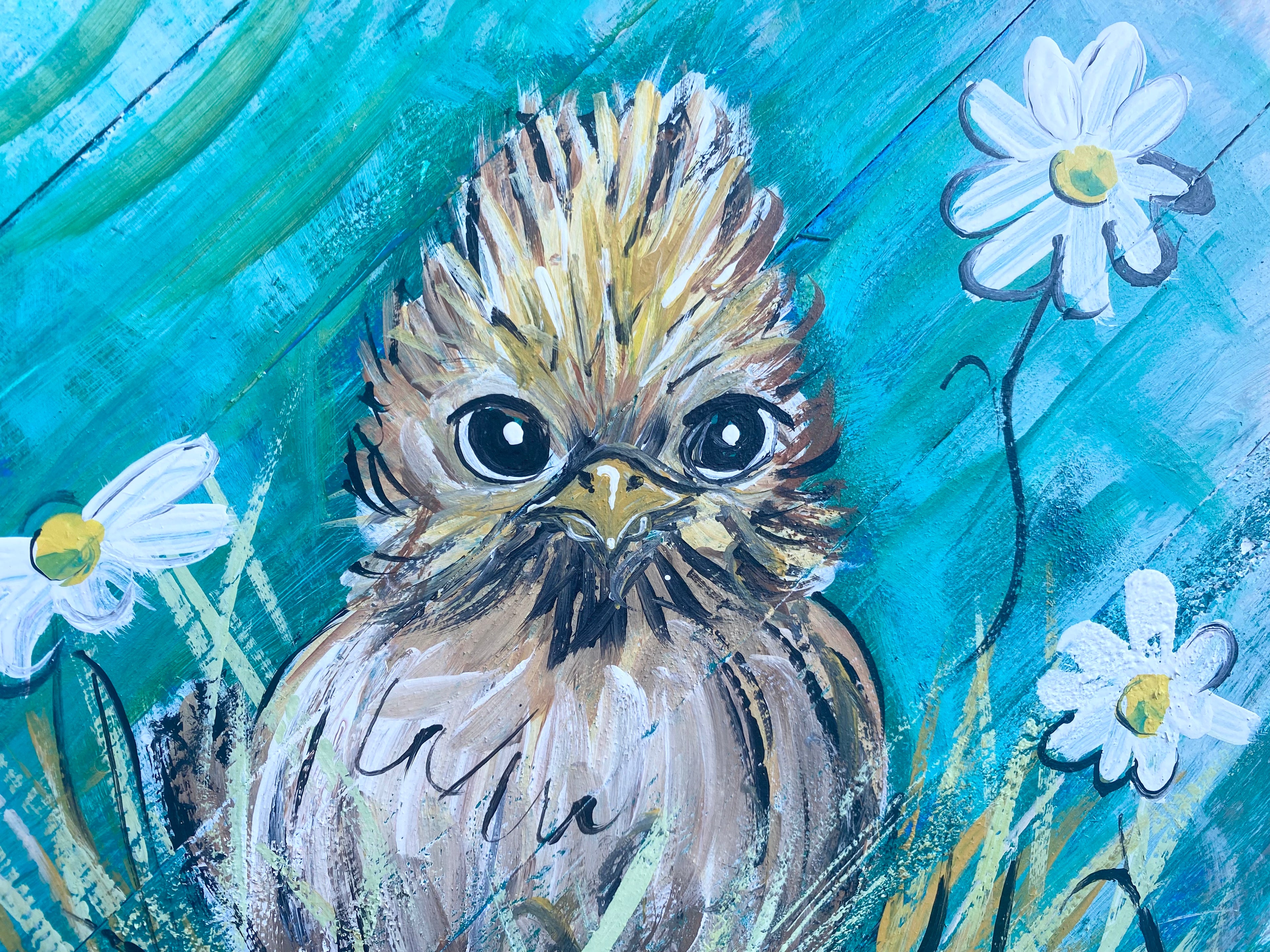 Painting of a bird with flowers on a blue background