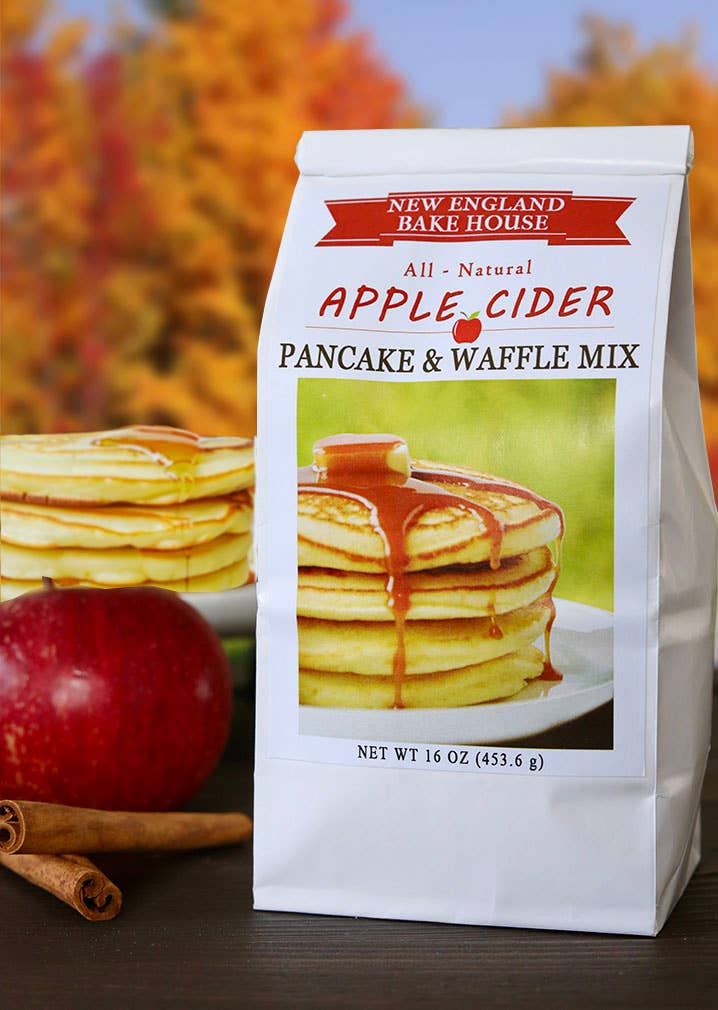 Bag of New England Bake House Apple Cider Pancake & Waffle Mix with autumn background