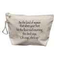 A beige canvas zippered pouch with a white rope handle, featuring black printed text with a humorous quote on a plain white background.