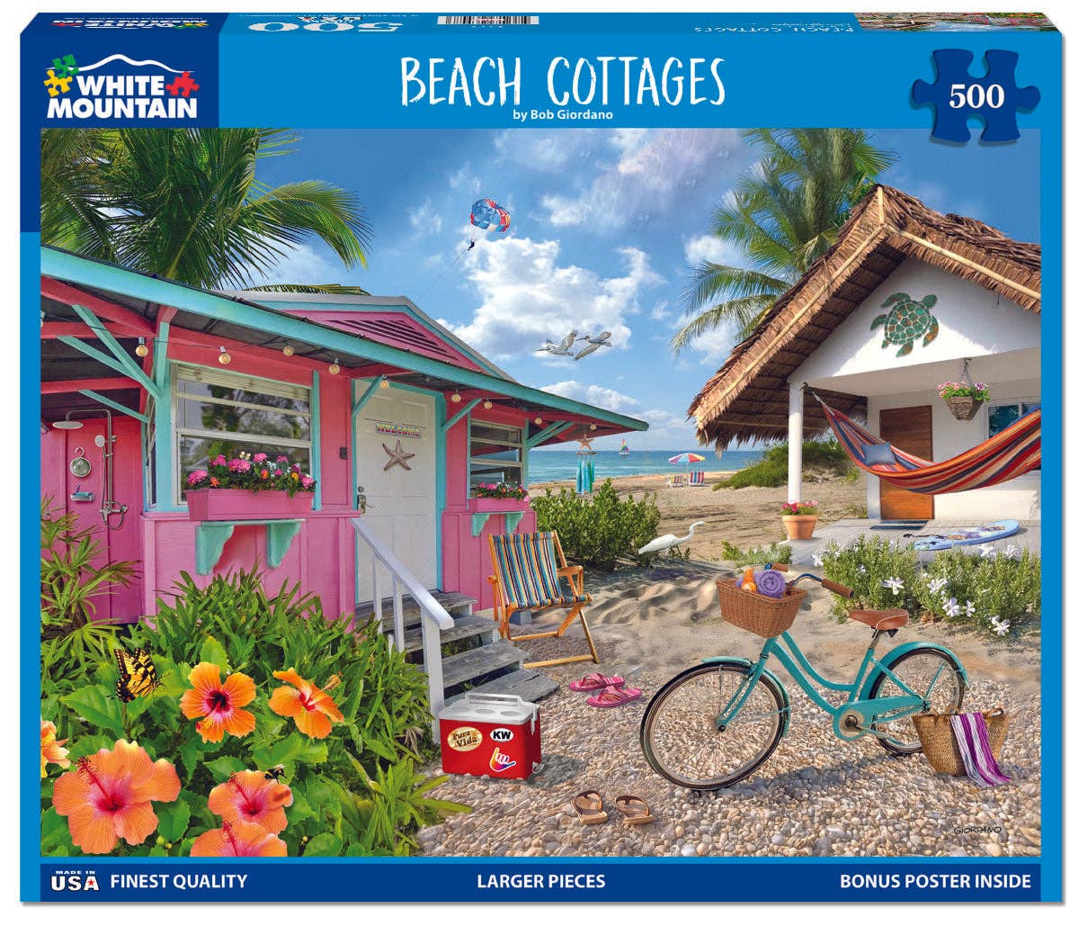 Jigsaw puzzle box featuring a beach scene with cottages, bicycle, and flowers.