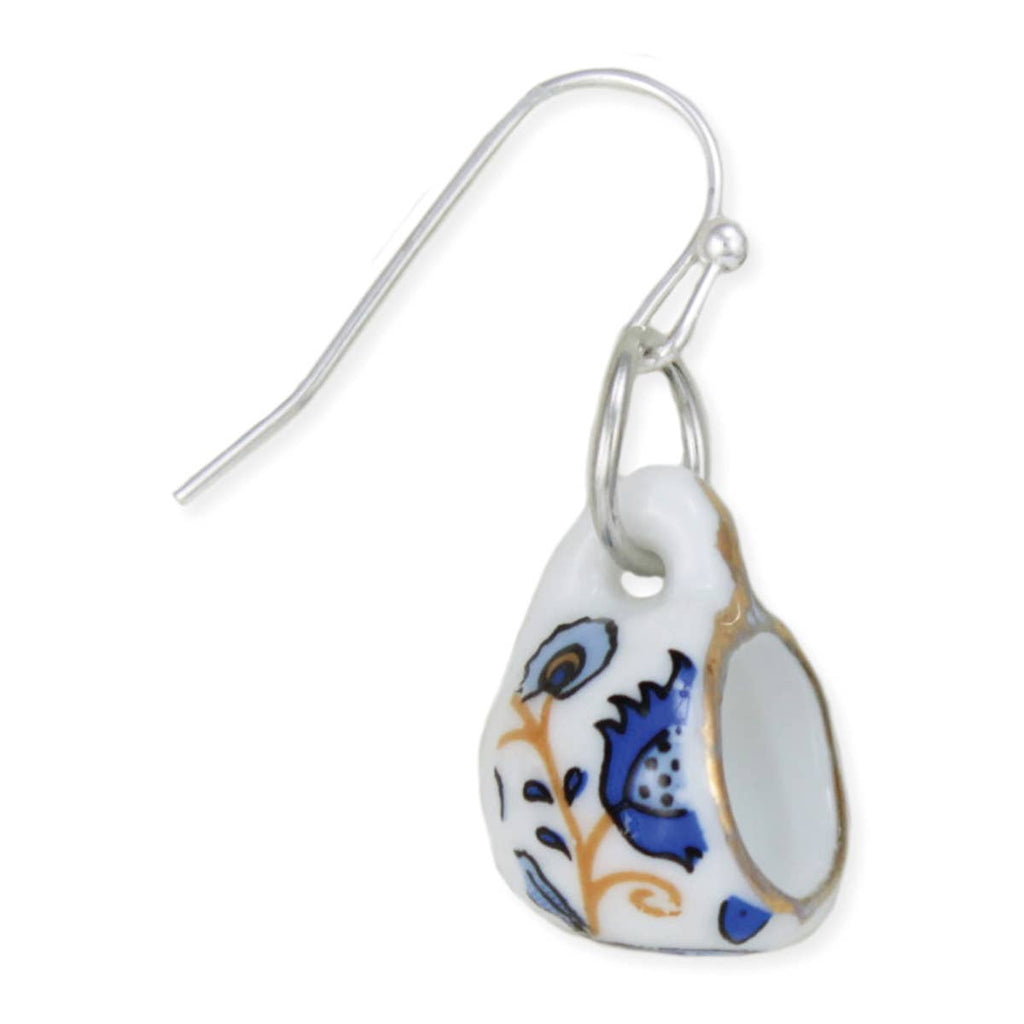 Earring with floral design on a white background