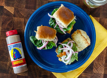 Load image into Gallery viewer, Blue plate with sliders, a bottle of Aardvark hot sauce on a wooden surface
