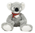 Plush toy koala with a red bow tie on a white background