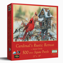 Load image into Gallery viewer, Jigsaw puzzle box featuring cardinals and a birdhouse on a red background

Details
