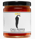 Jar of Brins chili pepper spread with a black lid on a white background