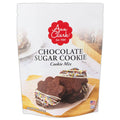 Packaging of Ann Clark chocolate sugar cookie mix with cookies on a wooden board.