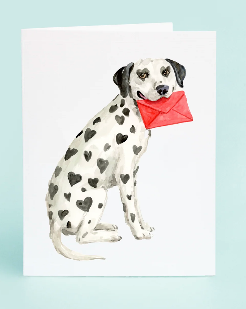 Dalmatian dog holding a red envelope on a light blue background

Details