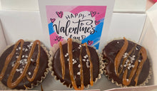 Load image into Gallery viewer, Three bonbons treats with caramel drizzle in a box with a Valentine's Day card.
