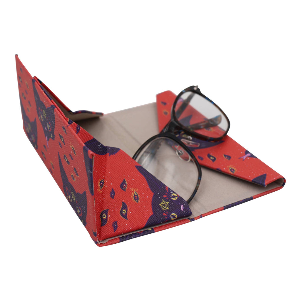 Red and purple patterned glasses case with a pair of glasses inside on a white background