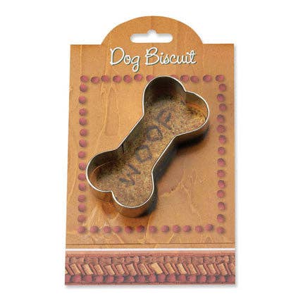 Dog biscuit in a bone-shaped cookie cutter on a branded packaging