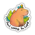 Sticker with a capybara and bird illustration and 'Don't Worry, Be Capy' text on a white background