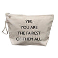 A light beige canvas pouch with a white zipper and a white rope handle, featuring the printed text 'YES, YOU ARE THE FAIREST OF THEM ALL.' in black capital letters, shown against a plain white background.