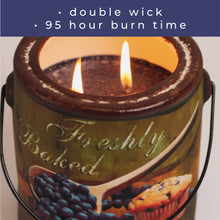 Load image into Gallery viewer, Candle with double wick and 95 hour burn time in a container labeled 'Fresly Baked'.
