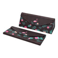 Brown eyeglass case with flamingo and leaf pattern on a white background