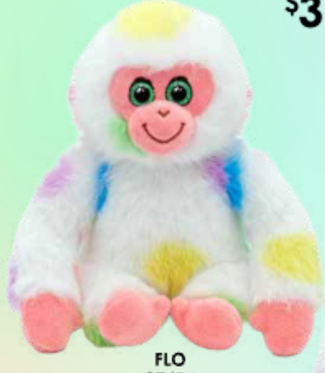A plush monkey toy with white fur and pastel rainbow tie-dye patches, pink face and feet, green eyes, and a smiling expression on a pale green background.