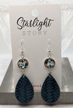 Load image into Gallery viewer, Pair of earrings on a 'Starlight Story' branded card.
