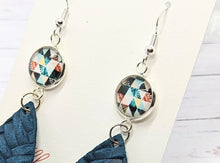 Load image into Gallery viewer, Earrings with geometric design and blue fabric accents on a white background

