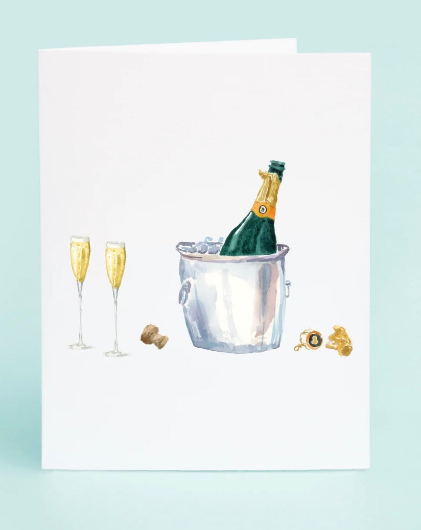 Greeting card with illustration of champagne bottle in ice bucket and flutes on light blue background