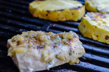 Load image into Gallery viewer, Grilled chicken breast and pineapple slices on a grill
