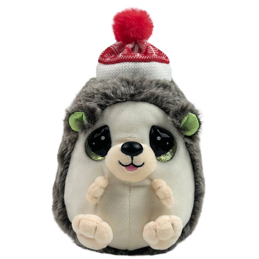 A plush hedgehog toy with a gray and cream body, large glossy black eyes, green inner ears, and a red-and-white knit hat with a red pom-pom on top, shown on a plain white background.