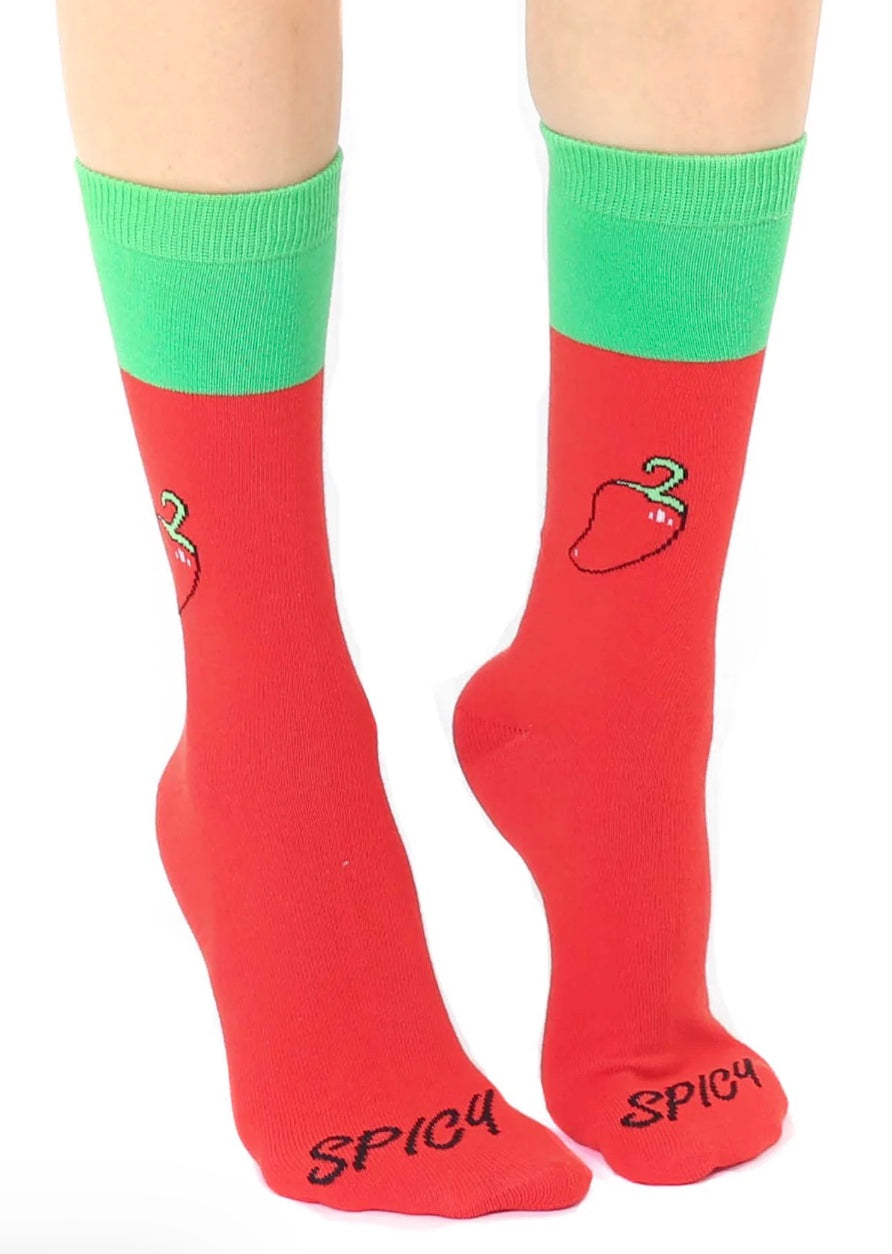 Red socks with green cuffs and 'Spicy' text on a white background