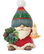 Load image into Gallery viewer, Decorative gnome figurine wearing a knitted hat and holding a candle, on a white background
