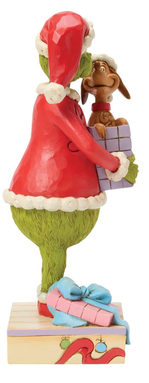 Animated character in a red outfit with a dog holding a gift, on a white background