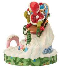 Load image into Gallery viewer, Decorative Christmas figurine of a character with a suitcase full of gifts on a white background
