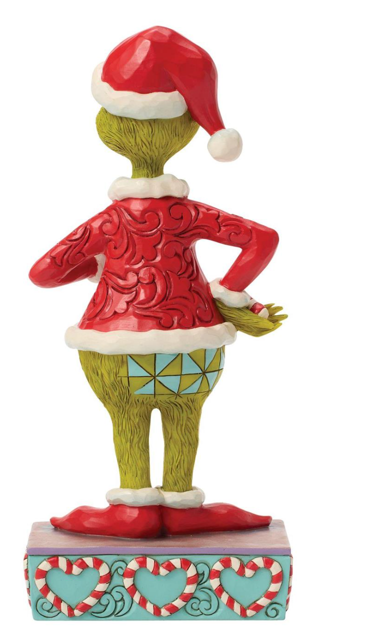 Figurine of a character in a red sweater and Santa hat on a white background