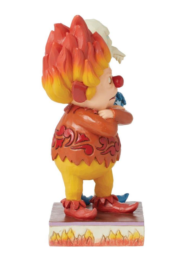 Animated character figurine with fiery hair on a white background