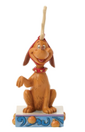 Dog figurine with a hat on a white background