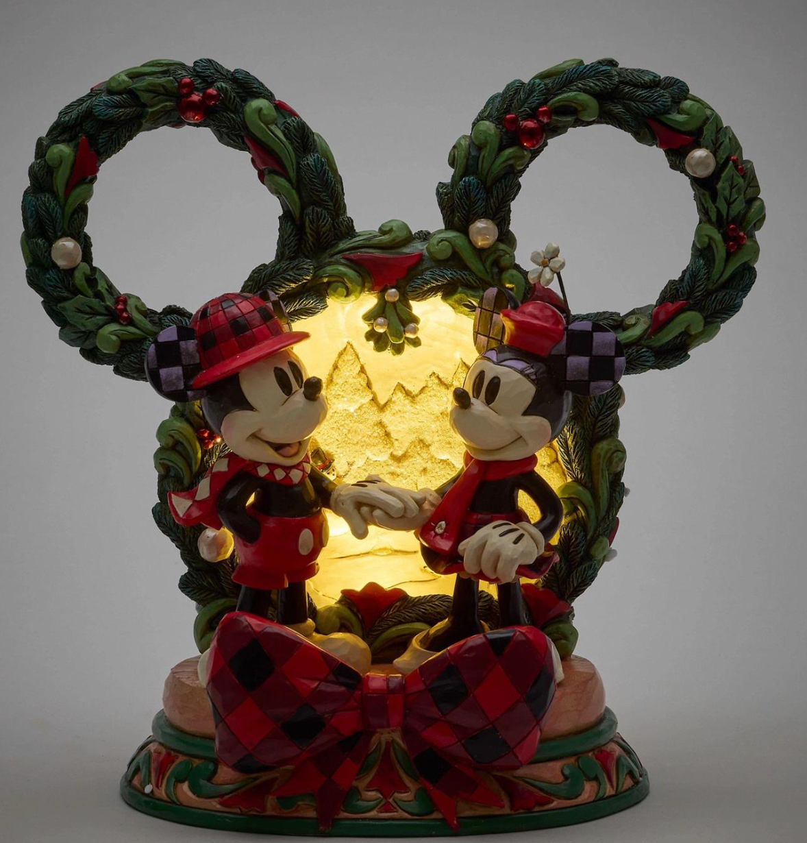 Decorative figurine of Disney's Mickey and Minnie Mouse with Christmas wreaths. LED. Artist Jim Shore.