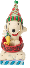 Load image into Gallery viewer, Snoopy figurine wearing a red and green striped party hat and a small green striped hat, sitting in a red bowl with a yellow duckling, on a white background.
