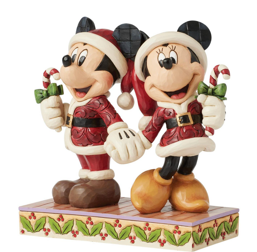 Disney's Mickey and Minnie Mouse in festive outfits holding candy canes on a white background. Artist Jim Shore
