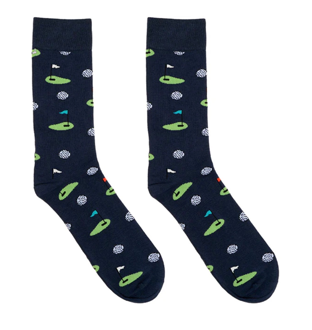 Pair of dark blue socks with green and white pattern on a white background